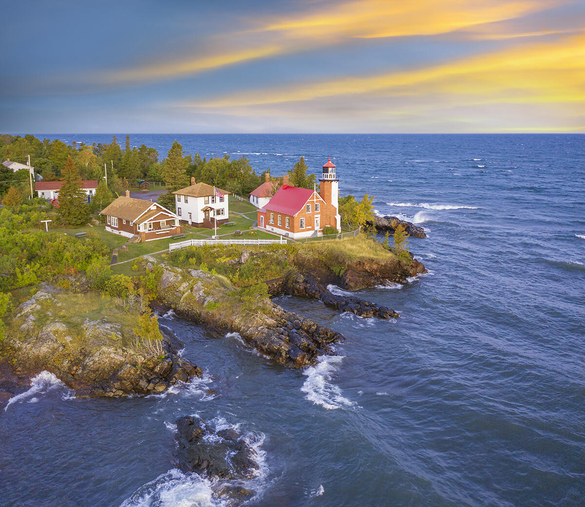 Michigan's Upper Peninsula, Eagle Harbor Lighthouse. Remote outpost at the Northern tip of the Keweenaw Peninsula in Lake Superior, amid windy autumn dawn.
